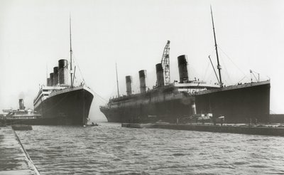 RMS Titanic being moved out of drydock to allow her sister ship, RMS Olympic, to have a propeller replaced, March 6, 1912 by English Photographer